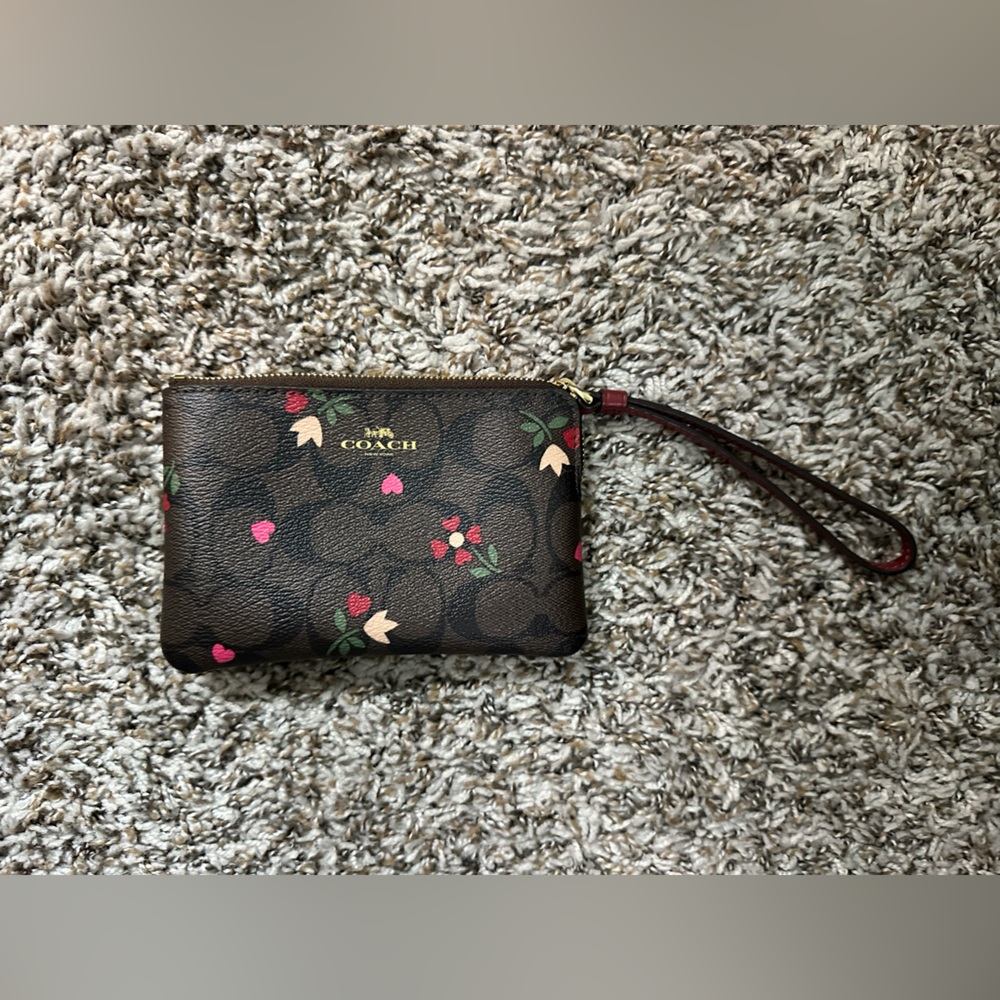 Coach Dark Brown Wristlet with Floral Design